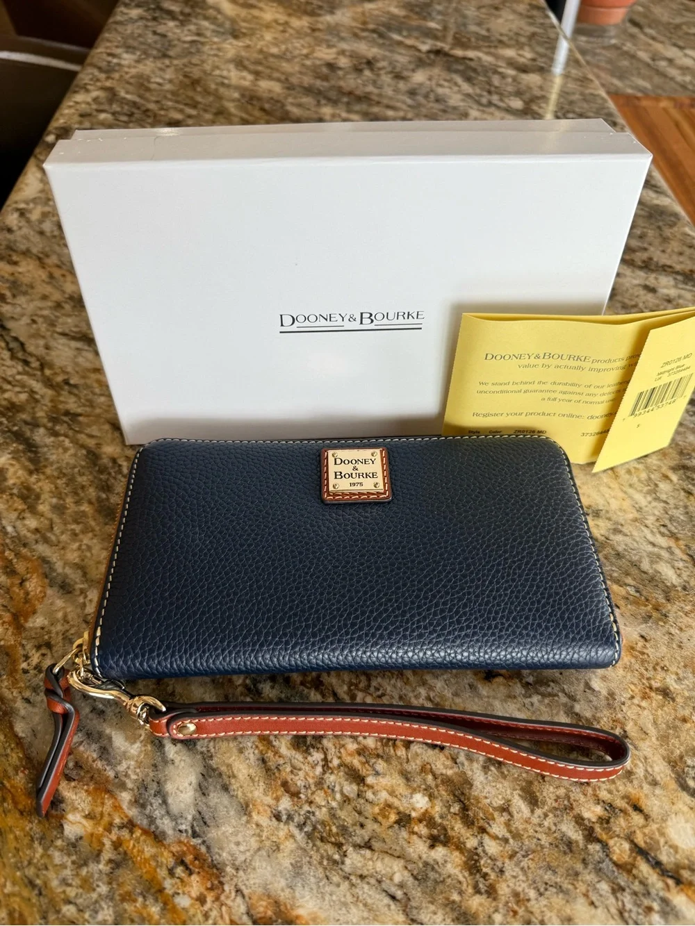 Dooney & Bourke Navy Pebble Leather Zip Wristlet with Tan Strap
